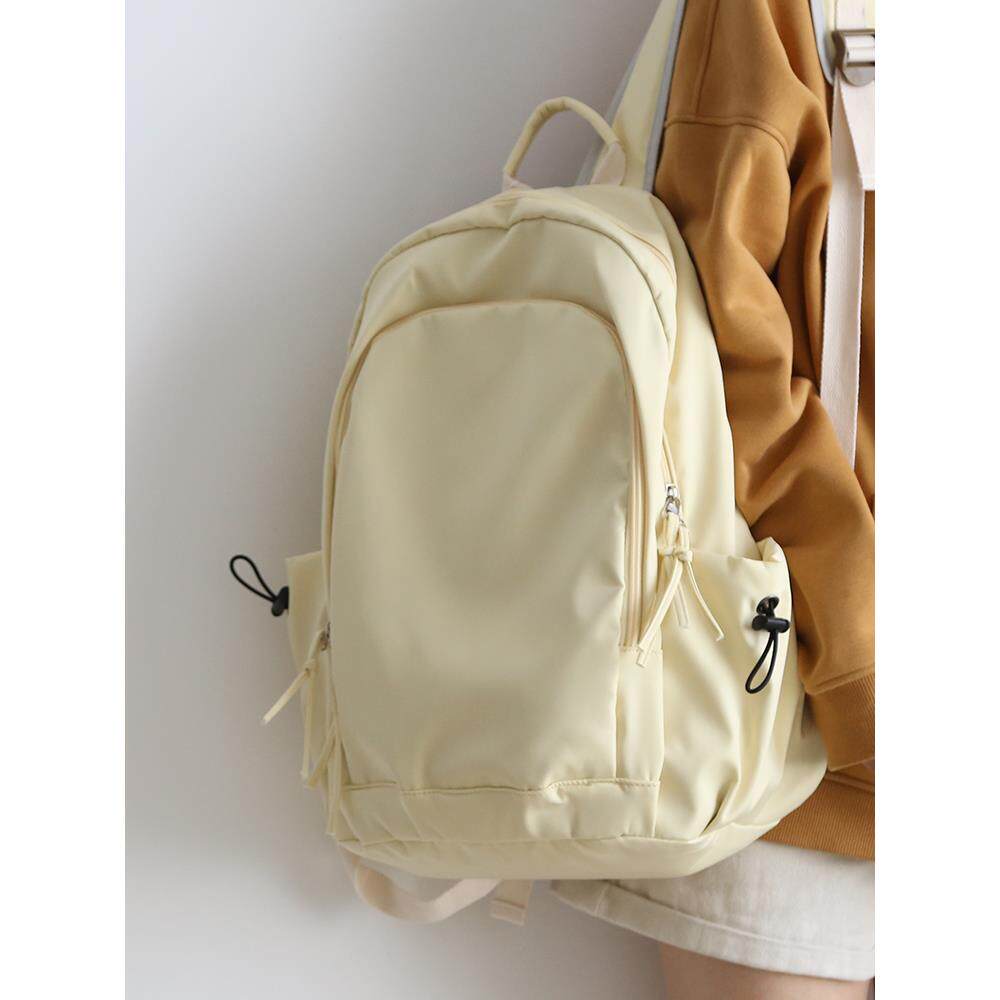 柠檬黄纯色大容量双肩包女休闲书包初中女生大学生背包女士双肩