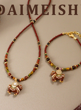 原创复古美拉德秋冬锆石铜钱滴油小马吊坠项链轻奢高级感锁骨链女