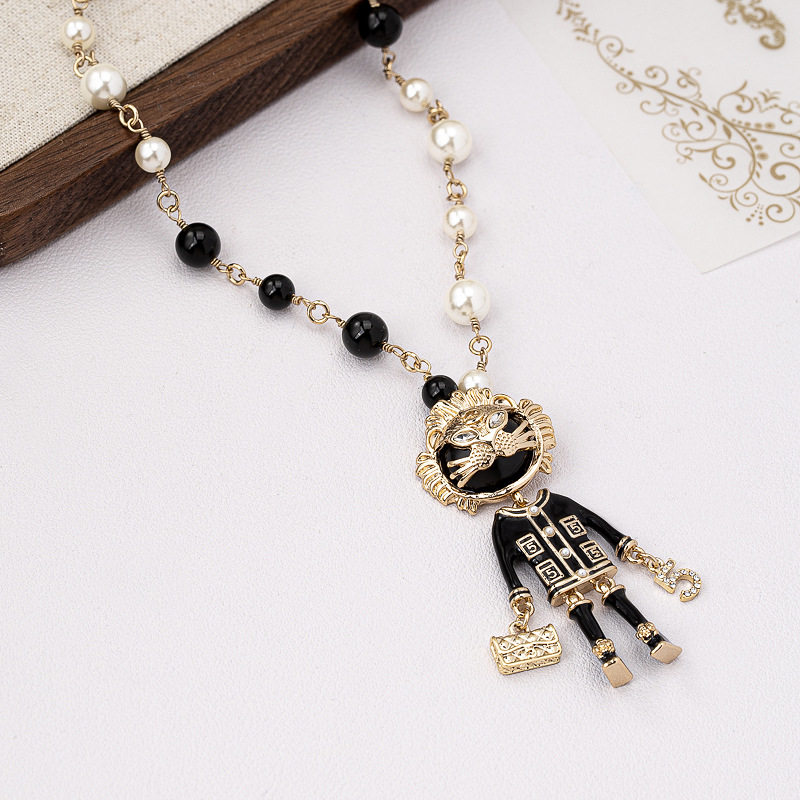 中古黑金小狮子吊坠黑白珍珠项链高级感小香风毛衣链女洋气项饰品