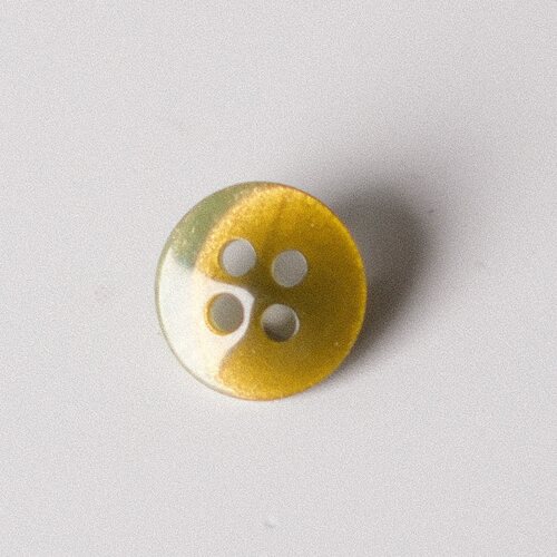 墨绿金黄渐变猫眼风纽扣