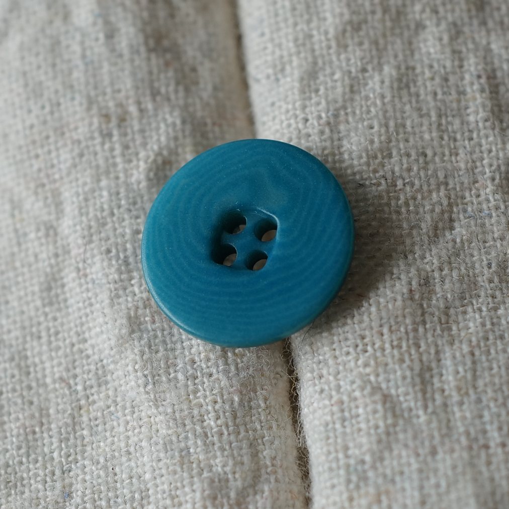 松石蓝四孔宽平边象牙棕榈纽扣