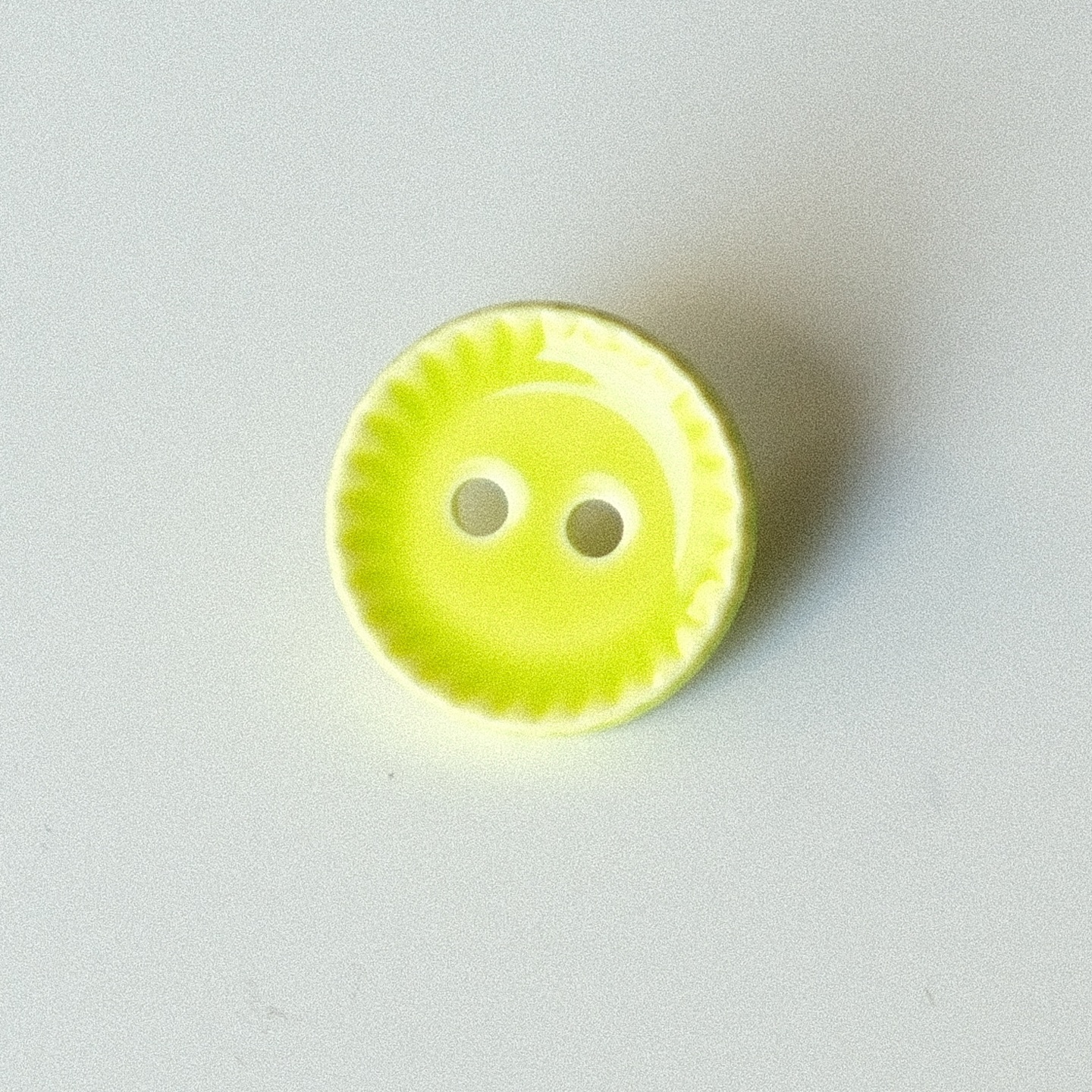 调色盘里的柠檬绿纹理凸边纽扣