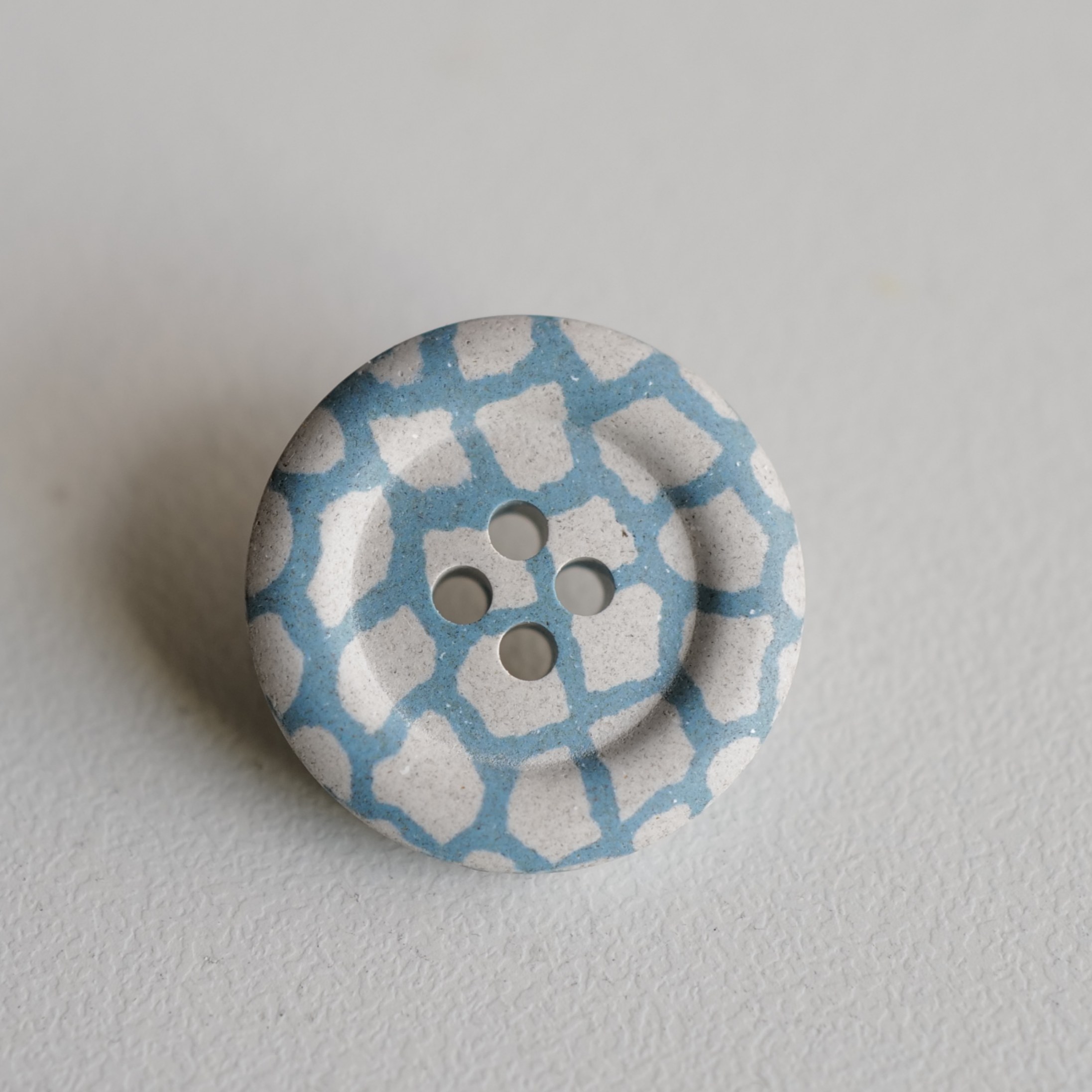 汉麻纤维石色不规则蓝格纽扣