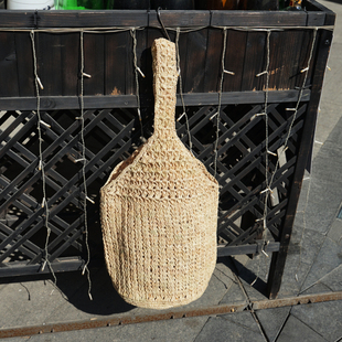 韩系手工镂空编织拉菲草水桶包单肩包女日系夏天度假沙滩包草编包