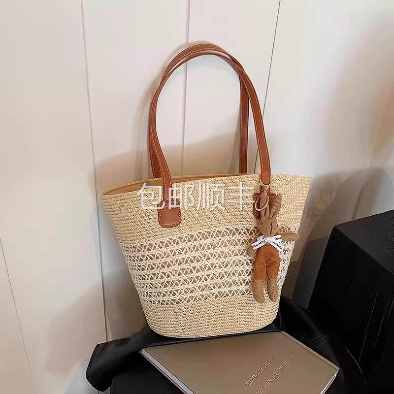 全球夏季流行度假风菜篮子编织包女海边草编包时尚百搭通勤单肩水