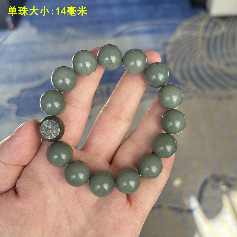 14毫米“铜镶玉”糖青玉籽料手串