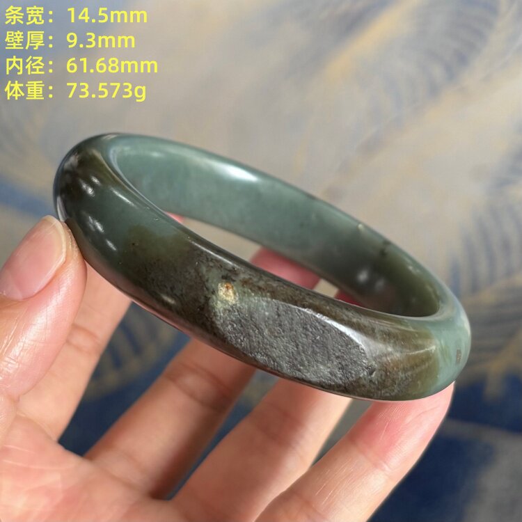 61.68“铜镶玉”糖青玉籽料手镯