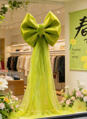 春天玻璃橱窗氛围布置绿色系珠光布蝴蝶结挂墙装饰浪漫氛围感装扮