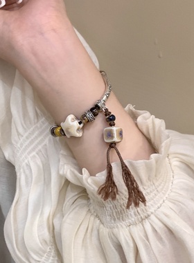 2026时尚厂家货源小众新中式陶瓷星星抽拉绳手链闺蜜手串复古手饰