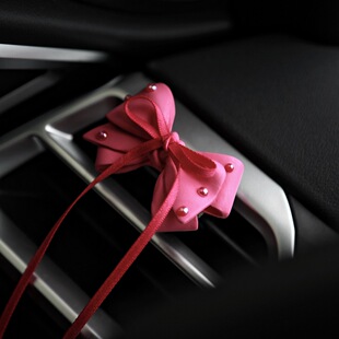 原创手工火龙果色蝴蝶结汽车出风口香薰汽车香水摆件车内饰品女生