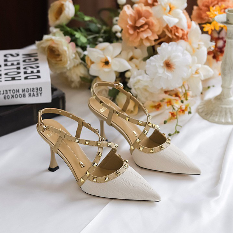 一代佳人2024夏季铆钉后空高跟鞋