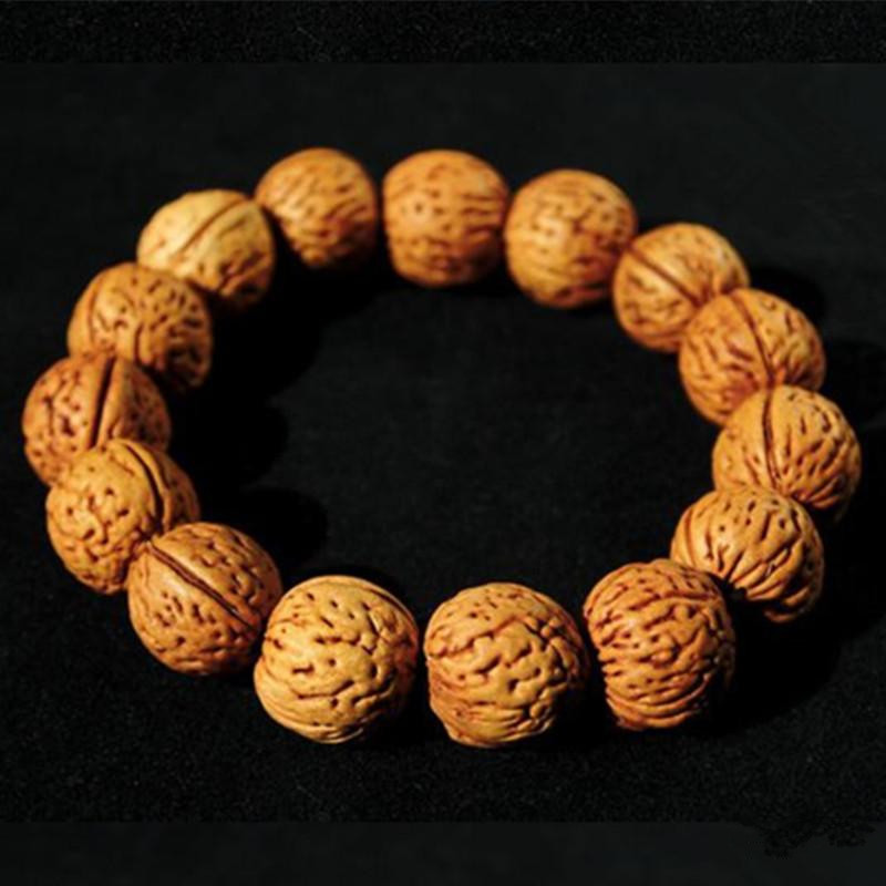 精品野桃核手串野生正圆脑纹蟠桃核手串手持矮桩原籽文玩男