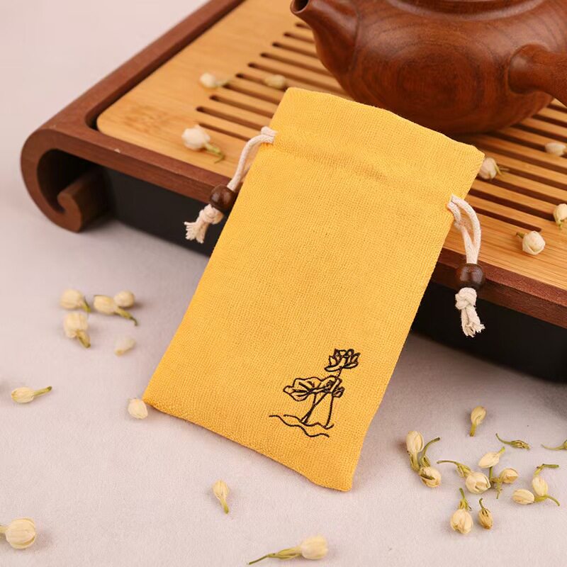 黄色亚麻荷花抽绳防尘香囊束口袋图片