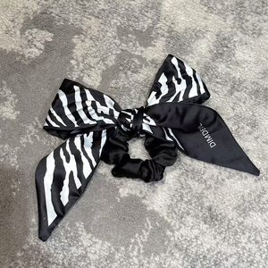 DIMDEVL汀黛2025年新款发饰女款斑马纹蝴蝶结发圈