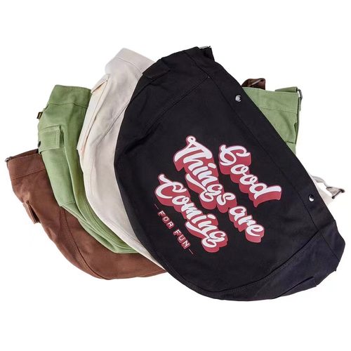 新品时尚潮流百搭字母帆布背包大容量单肩斜挎包男女情侣款运动包