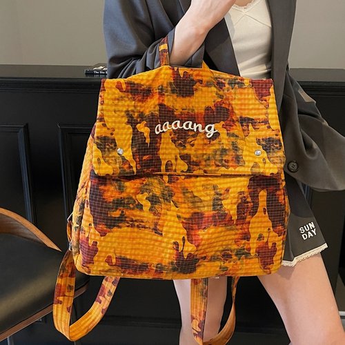 街头嘻哈风大容量双肩包潮2025夏季新款小众设计晕染百搭通勤女包