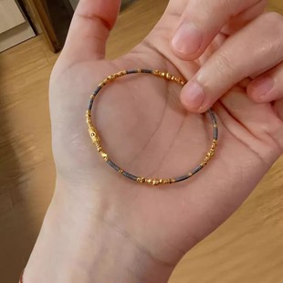 黄金色碎碎金编绳手链2026本命年手绳雾霾蓝灰高级感气质显白手饰