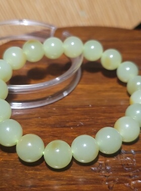 YQ032403新疆的猫28.4克10mm色调油亮颜色纯正且末黄口玉圆珠手链