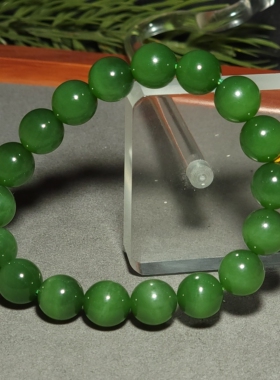 新疆的猫L122001 40.9克，11.5mm特别惊艳的老坑冰底阳绿圆珠手链