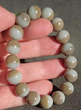 新疆的猫W121804 43.11克，泛蓝熟肉聚半糖的聚宝盆手串