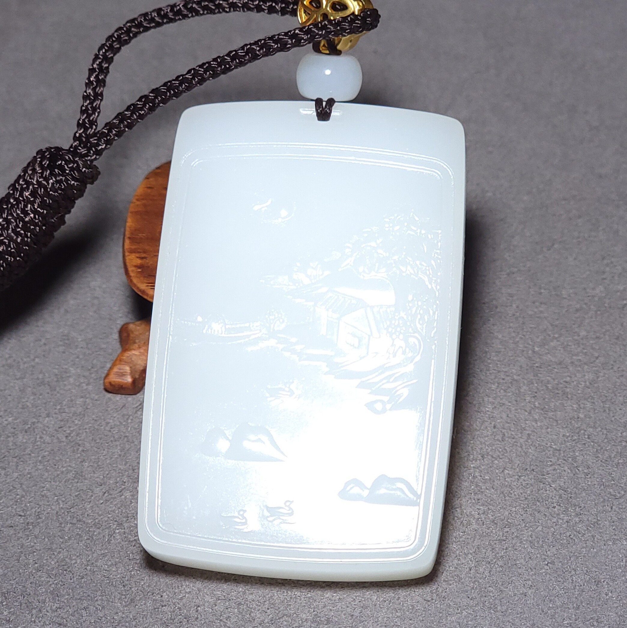 L050906新疆的猫59.7克白度浓郁黑皮俄料三高羊脂白玉山水牌