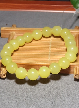 L010502 32.4克，直径10mm色调油亮颜色纯正的若羌鸡油黄圆珠手链