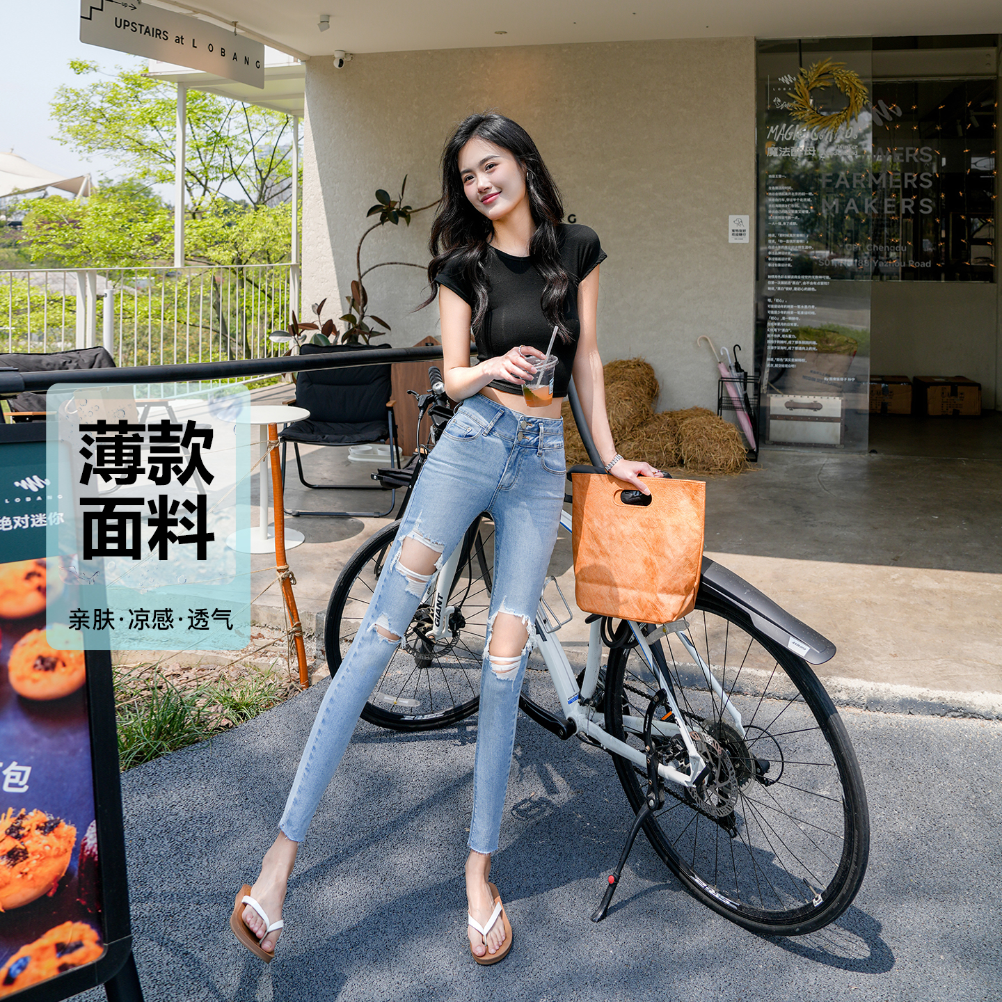 2025夏季薄款大破洞小脚牛仔裤女浅蓝色两粒扣高腰修身显瘦铅笔裤