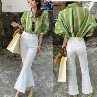 TOP 欧制-休闲简约百搭9分外长借位侧缝小开叉设计九分微喇牛仔裤