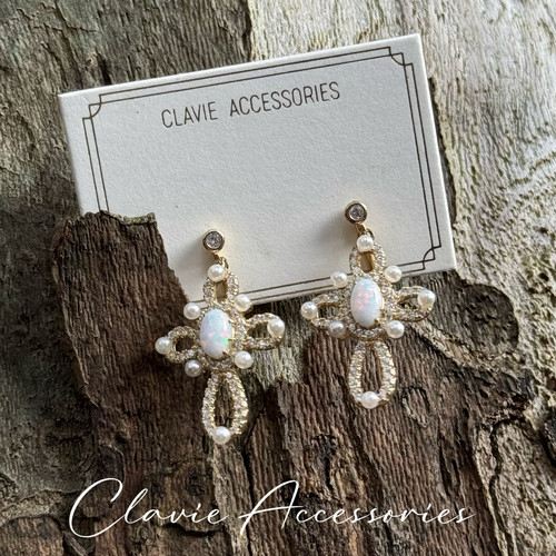 高级感轻奢925纯银日本人造欧泊欧珀opal十字架耳钉蚊香盘耳夹女