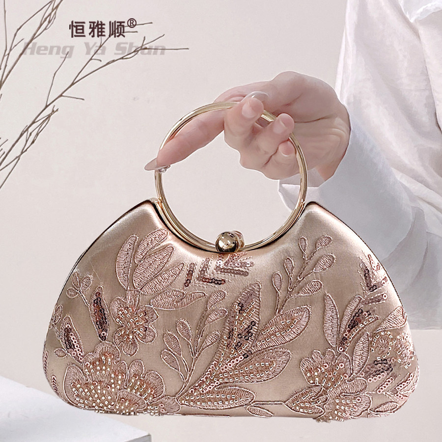 恒雅顺重工珠绣新中式晚宴手拿包图片