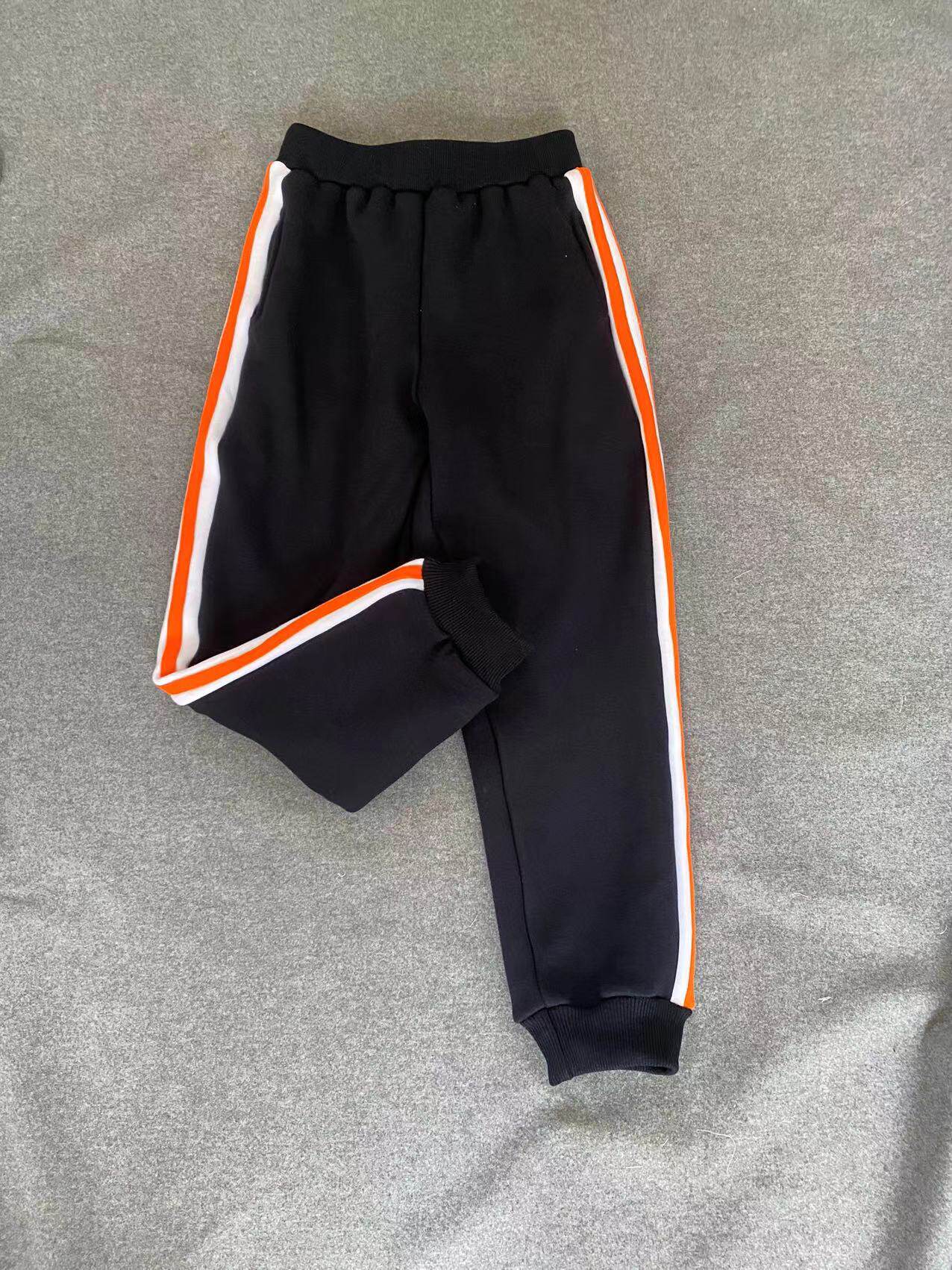 CUSTOM-MADE SPRING AUTUMN AND WINTER MENS AND WOMENS SWEATPANTS ARE SPLICED WIDE WHITE STRIPS AND 2 ORANGE RED BARS AND VELVET THICKENED COTTON SWEATPANTS