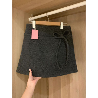 灰色毛呢半身裙子女秋冬季2024新款miu系小个子a字包臀裙加厚短裙