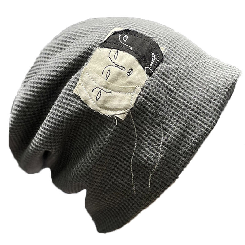 HONG KONG PURCHASING STICKERS INTERNET CELEBRITIES PILES OF HATS WOMENS BLACK HEAD HATS KOREAN VERSION PULLOVER HATS COUPLE KNITTED HATS EAR PROTECTION