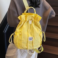 新款轻便防水抽绳个性双肩包男女生户外休闲登山背包女出游学生包