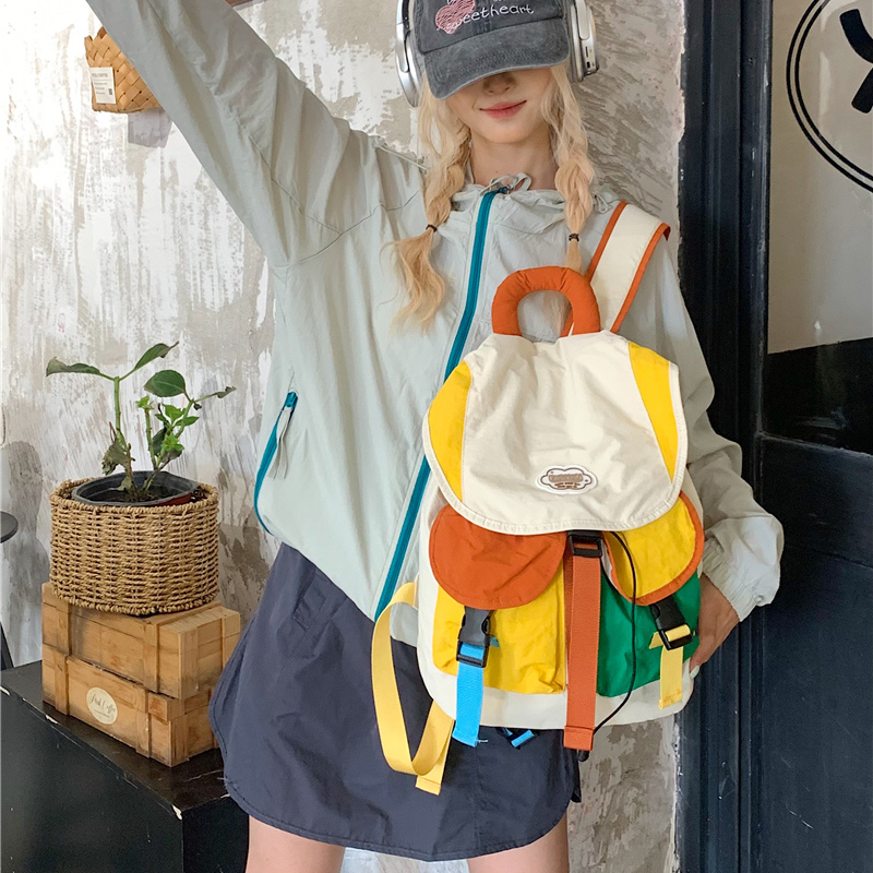 儿童日系超轻拼色户外旅行双肩背包男女童幼儿园多口袋大容量书包