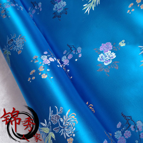 cos服装布料蓝底小花织锦缎