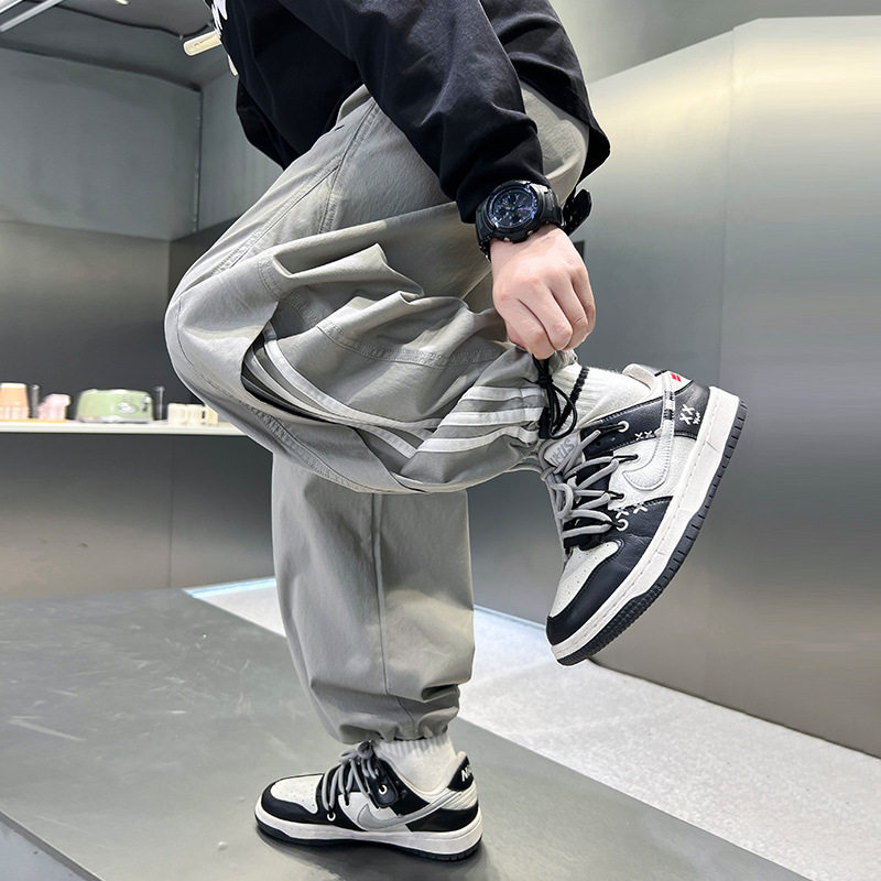 男童休闲裤子宽松运动裤2026新款中大童春装儿童男孩条纹拼接长裤