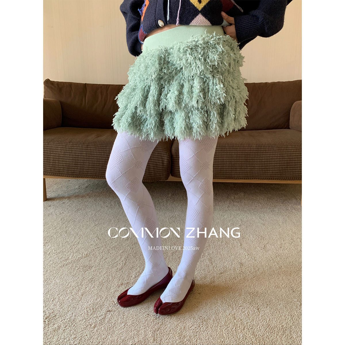 CZ ZHANG 2025秋冬少女流苏A字小短裙女百搭休闲毛绒蓬蓬蛋糕裙