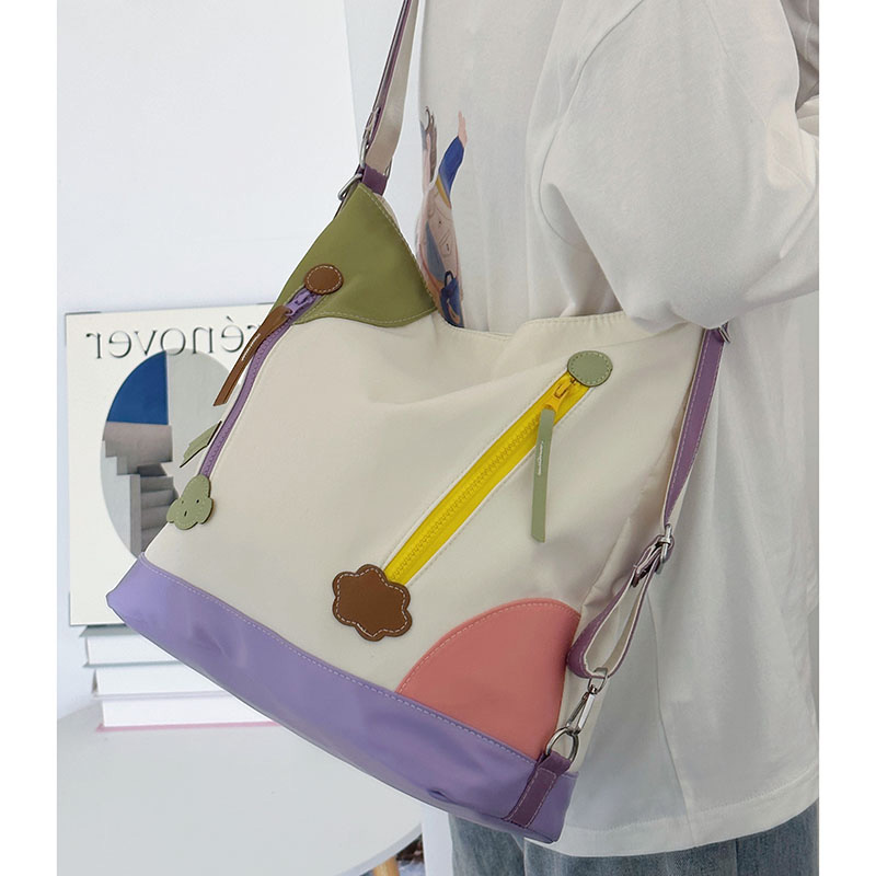 小众撞色帆布包女2025夏新款时尚通勤单肩托特包多用百搭双肩背包