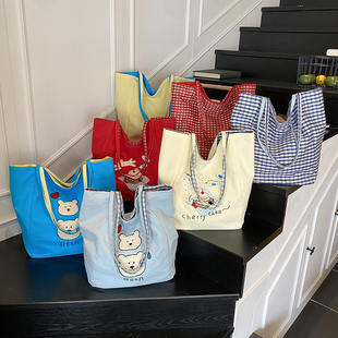 可爱卡通轻便帆布袋子2025新款学生上课补习托特包大容量单肩包女
