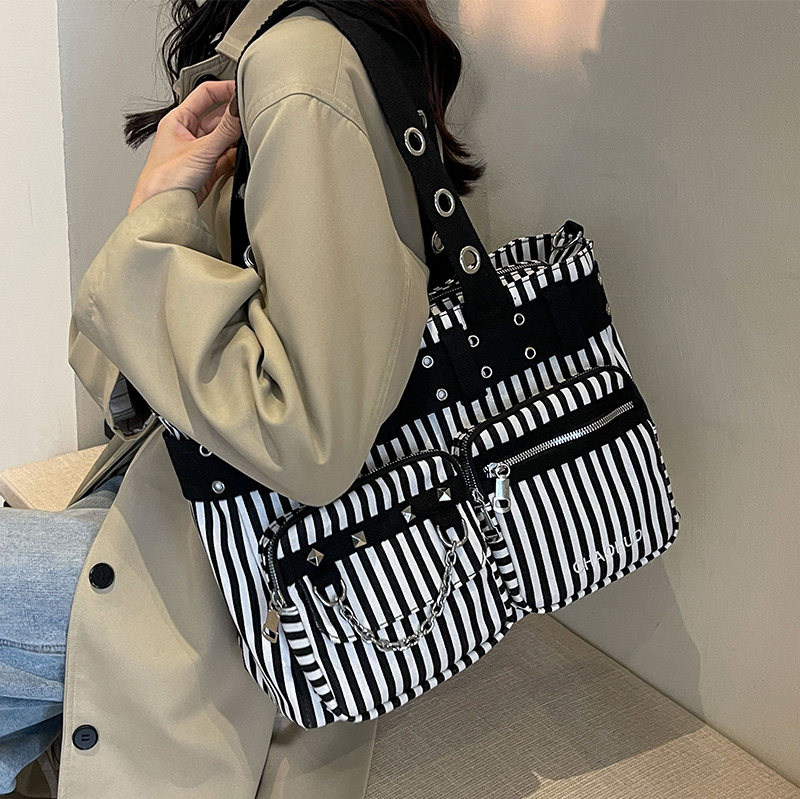 帆布包包女2024新款条纹通勤托特包重金属辣妹单肩百搭复古斜挎包,箱包皮具/热销女包/男包,托特包,淘宝优惠券,粉丝福利购,淘宝优惠卷