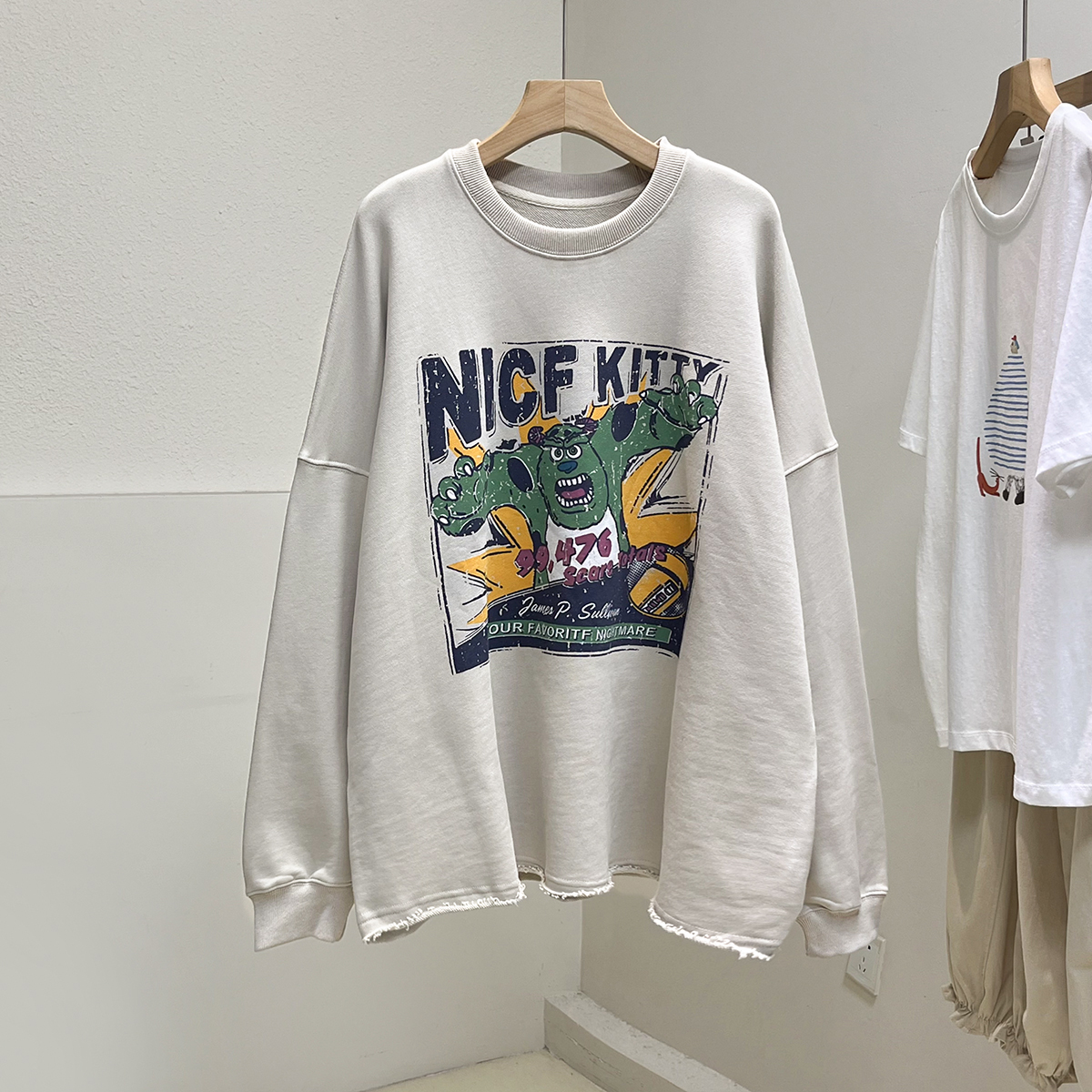 韩版复古水洗棉毛圈卷边怪兽印花卫衣女宽松慵懒风百搭减龄短上衣