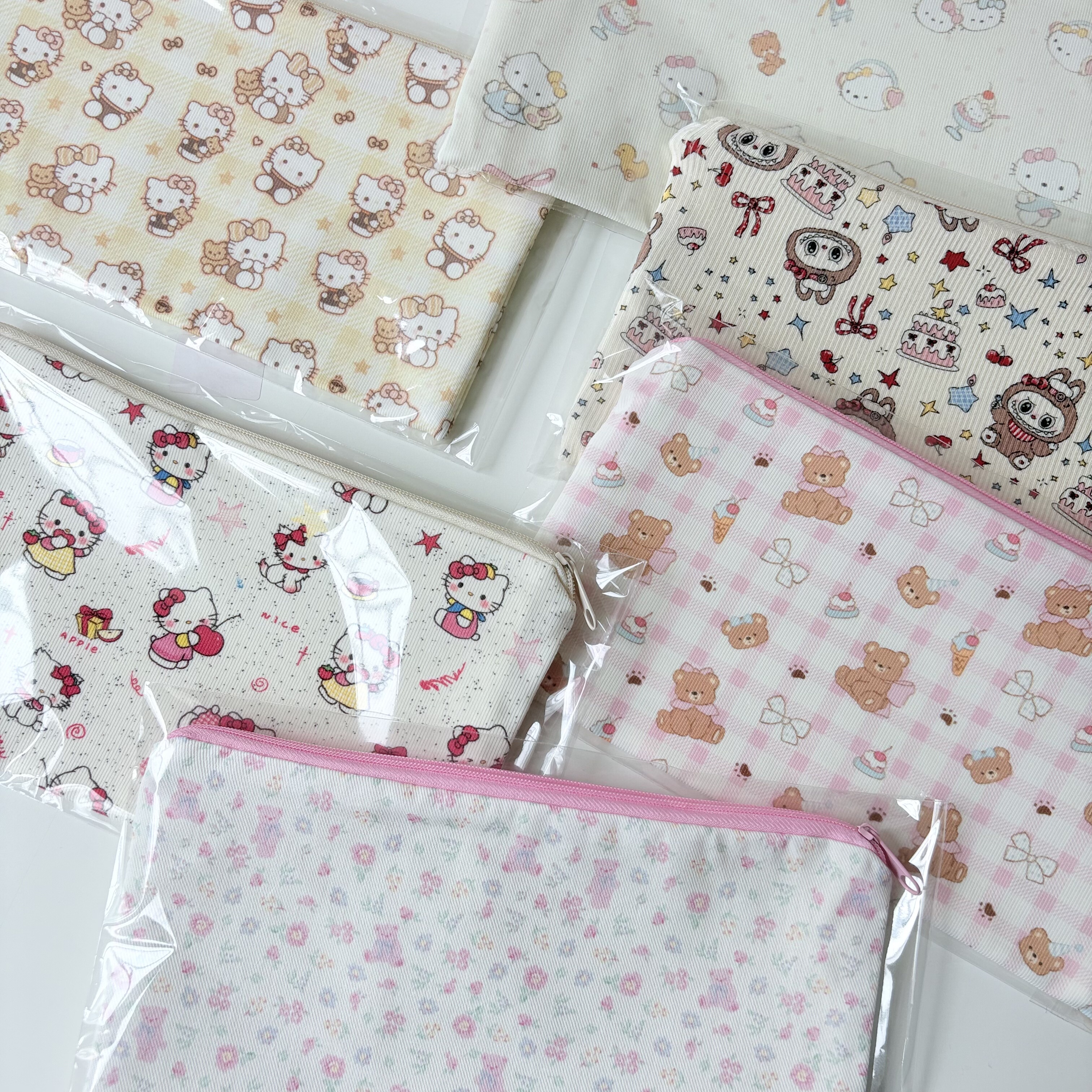 410买二送一随机送一个上新限时优惠价手机挂绳小收纳包可爱kitty