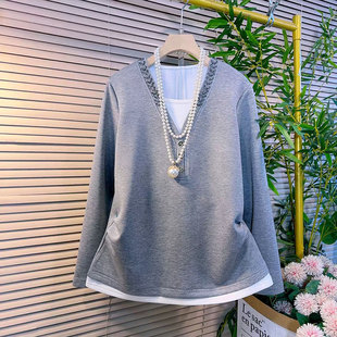 时尚拼接假两件设计感收腰显瘦百搭衫上衣春季新款2026大码女装潮