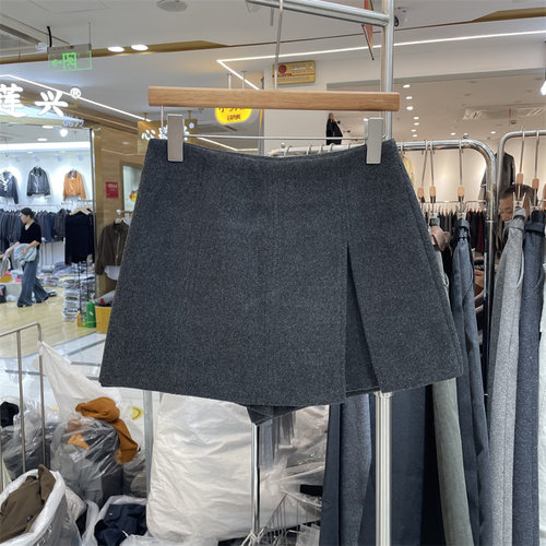8090服饰B25728-1正品冬季韩版高腰开衩不规则毛呢半身裙女短裙裤