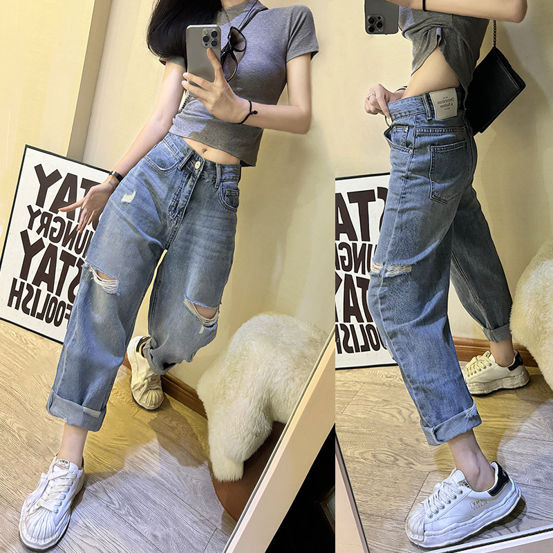 夏季薄款宽松破洞牛仔裤女2025年时尚高腰浅蓝色老爹跨裤哈伦裤潮