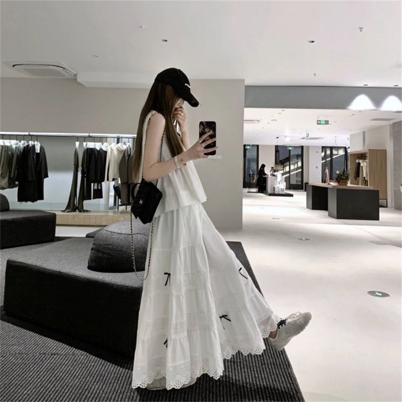 两件套装慵懒松弛感穿搭一整套装蝴蝶结设计无袖衬衣搭配半身长裙