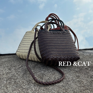 高级感手提单肩斜挎水桶包 复古风手工编织牛皮托特包女2026新款