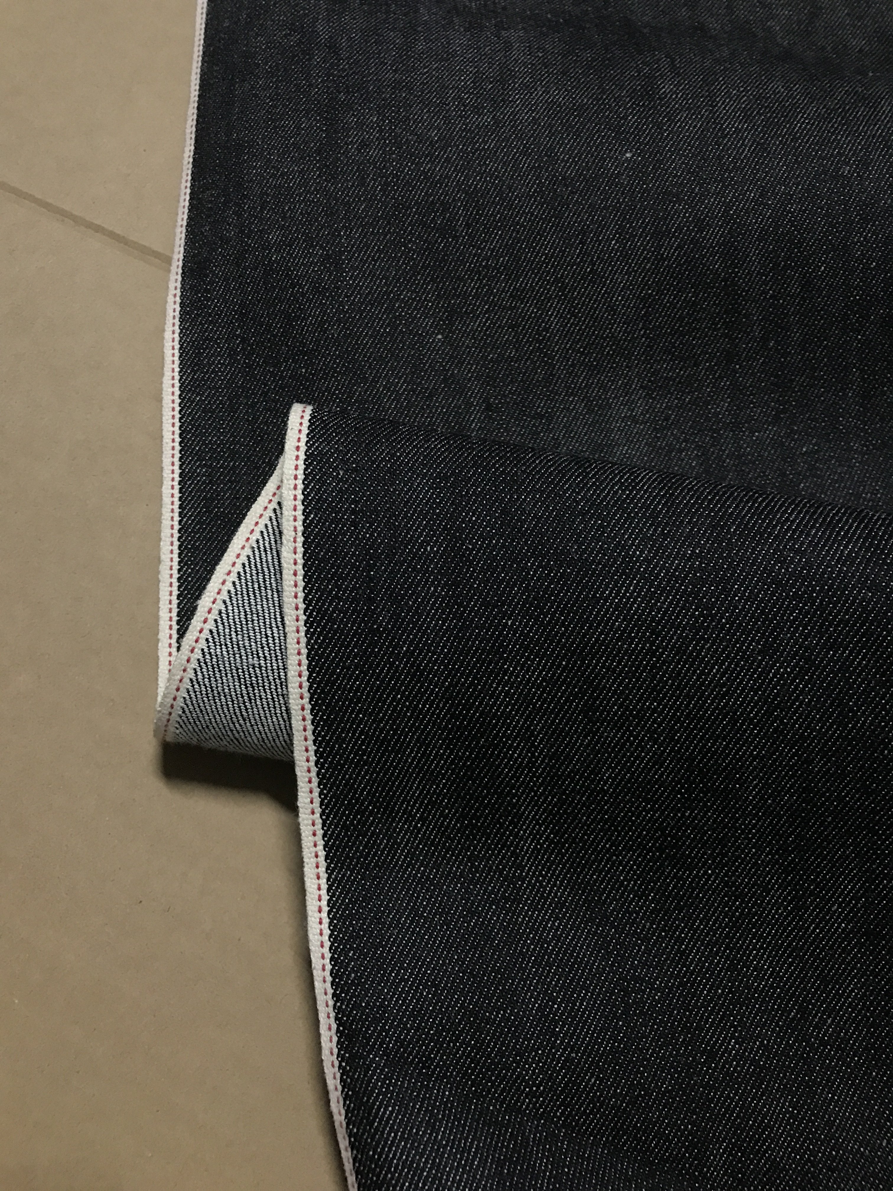 金佳微厚挺括微弹日本丹宁高端赤耳原浆黑色斜纹红边牛仔布料