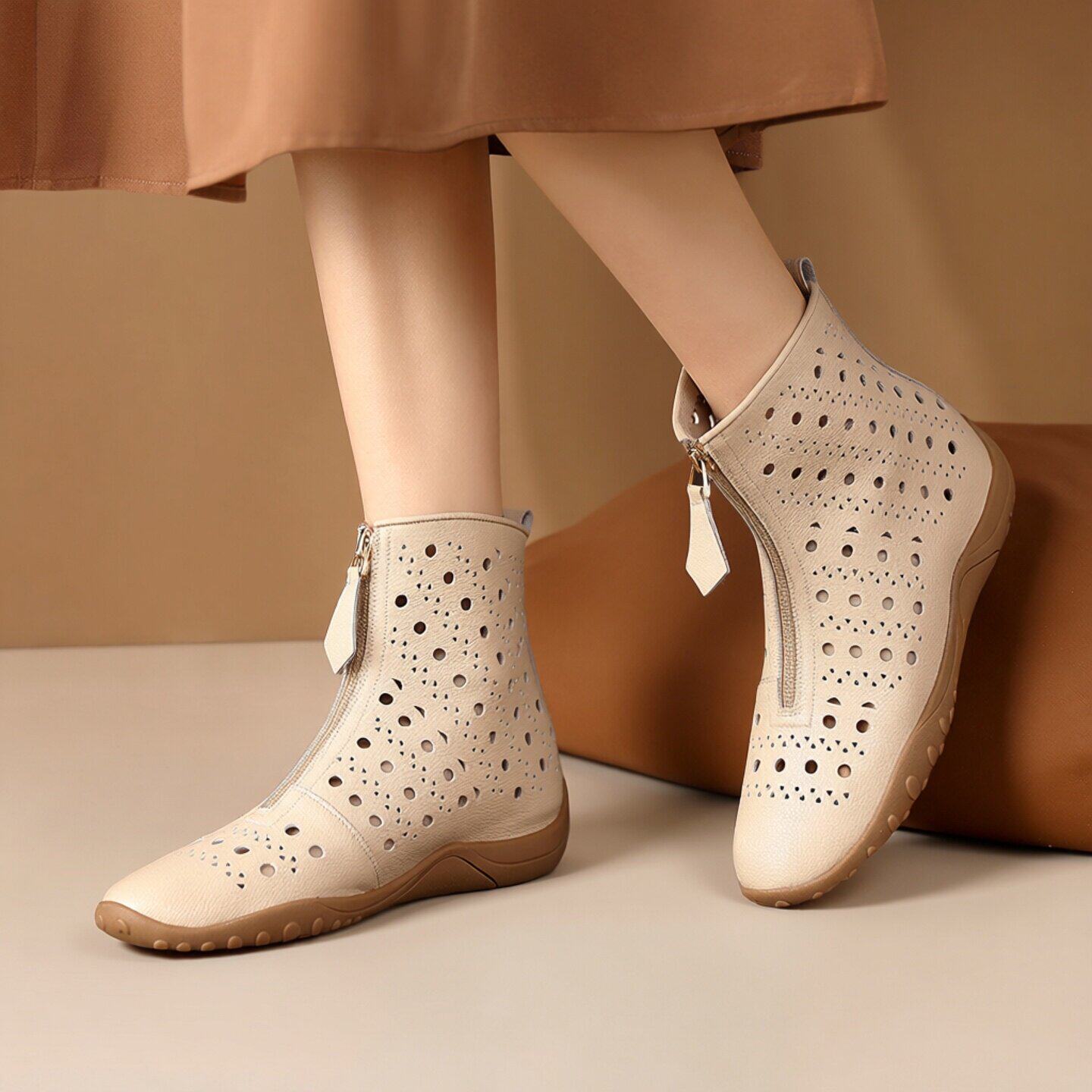 真皮镂空短靴女2026新款春秋透气凉靴百搭平底软底前拉链洞洞鞋子